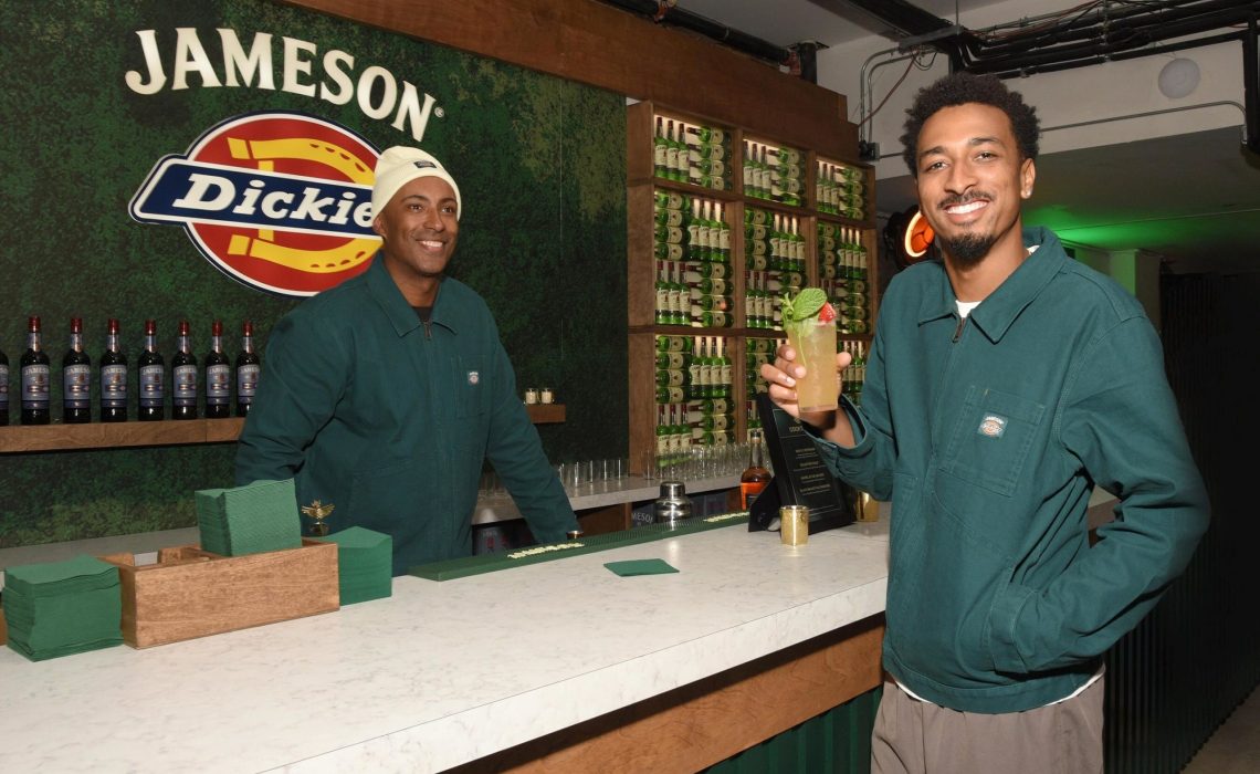 Actor Travis Bennett, wearing pieces from the Jameson Irish Whiskey x Dickies ‘Crafted Together’ collection, enjoyed a refreshing cocktail at the pop-up in New York to celebrate the launch of the new clothing line. Photo Credit: Michael Simon